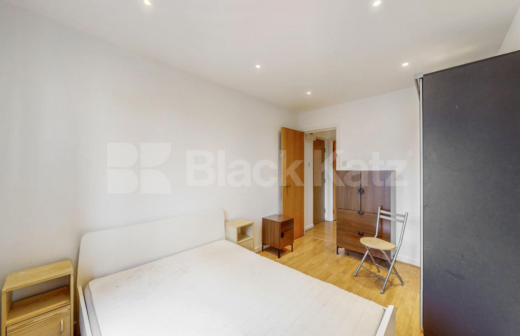 Top floor private development with charming balcony, communal gardens & parking Towergate , Pages Walk 